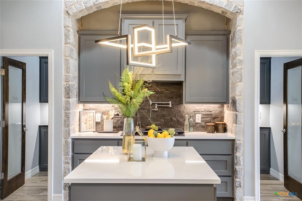 Premium kitchen build-out with designer finishes in an upgraded Hartrick Ranch home