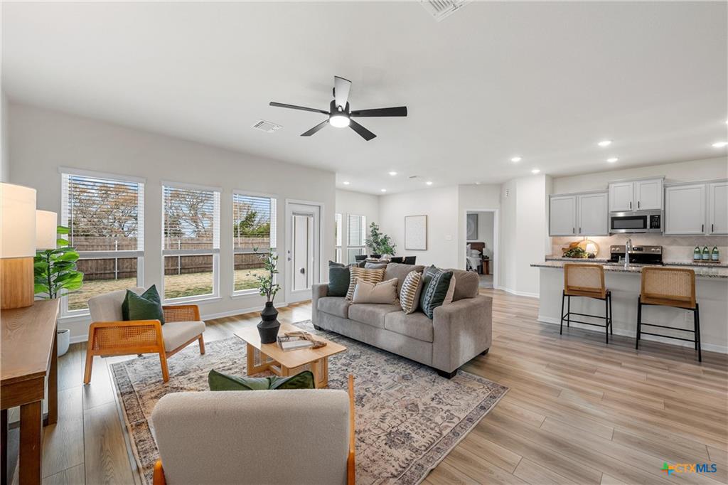 Open living and dining layout with natural light, typical Montgomery floor plan