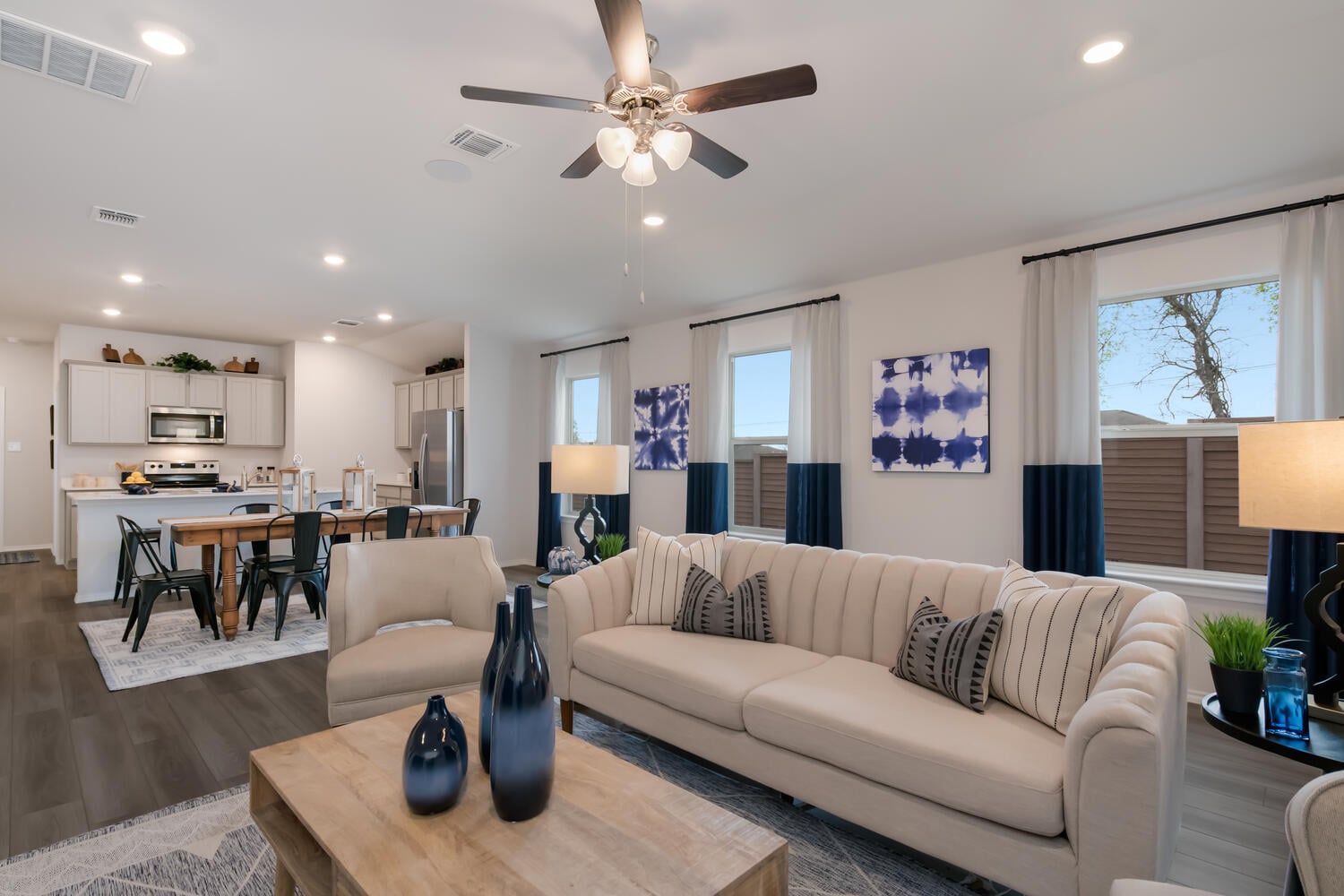 D.R. Horton living area in a Temple TX new construction home showing open floor plan and builder-grade finishes
