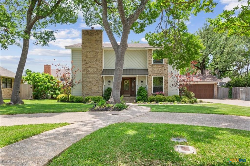 Front elevation of a mid-range home on Olympia Dr in Cliffs of Canyon Creek