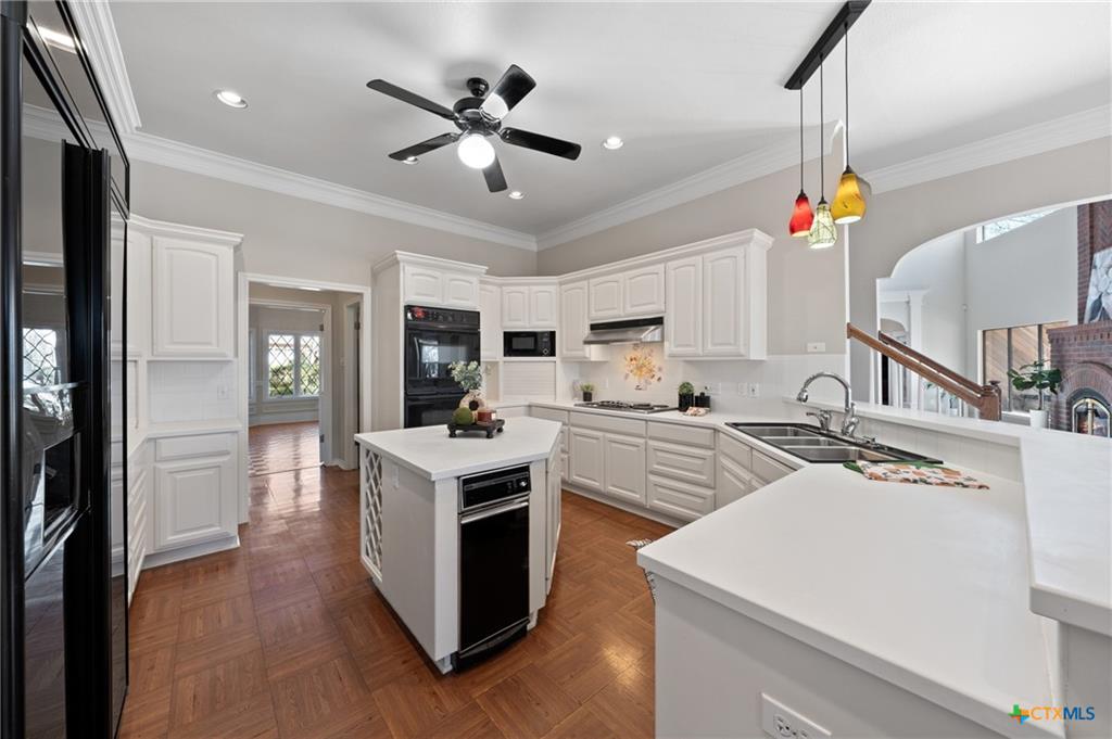 Updated kitchen in a Phase I Cliffs of Canyon Creek home