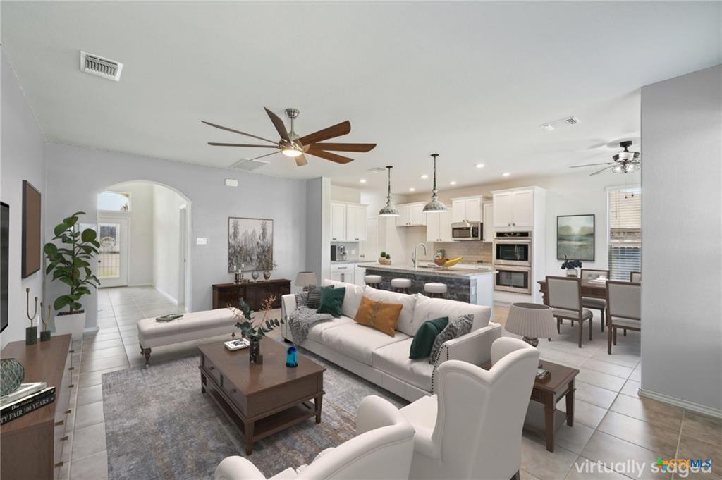 6301 Dorothy Muree Drive open living area to kitchen, virtually staged listing photo