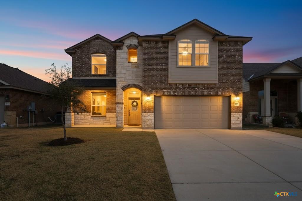 Twilight exterior photo of D.R. Horton home on Dorothy Muree Drive in Alta Vista