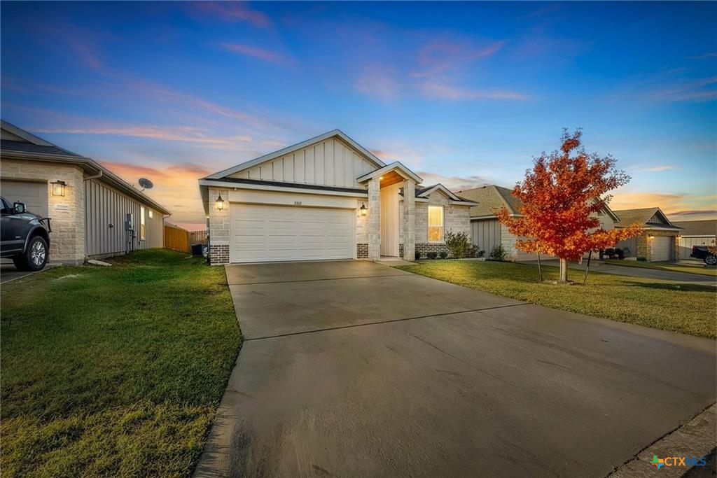 7713 Purvis Street twilight exterior — Pea Ridge subdivision, West Temple TX
