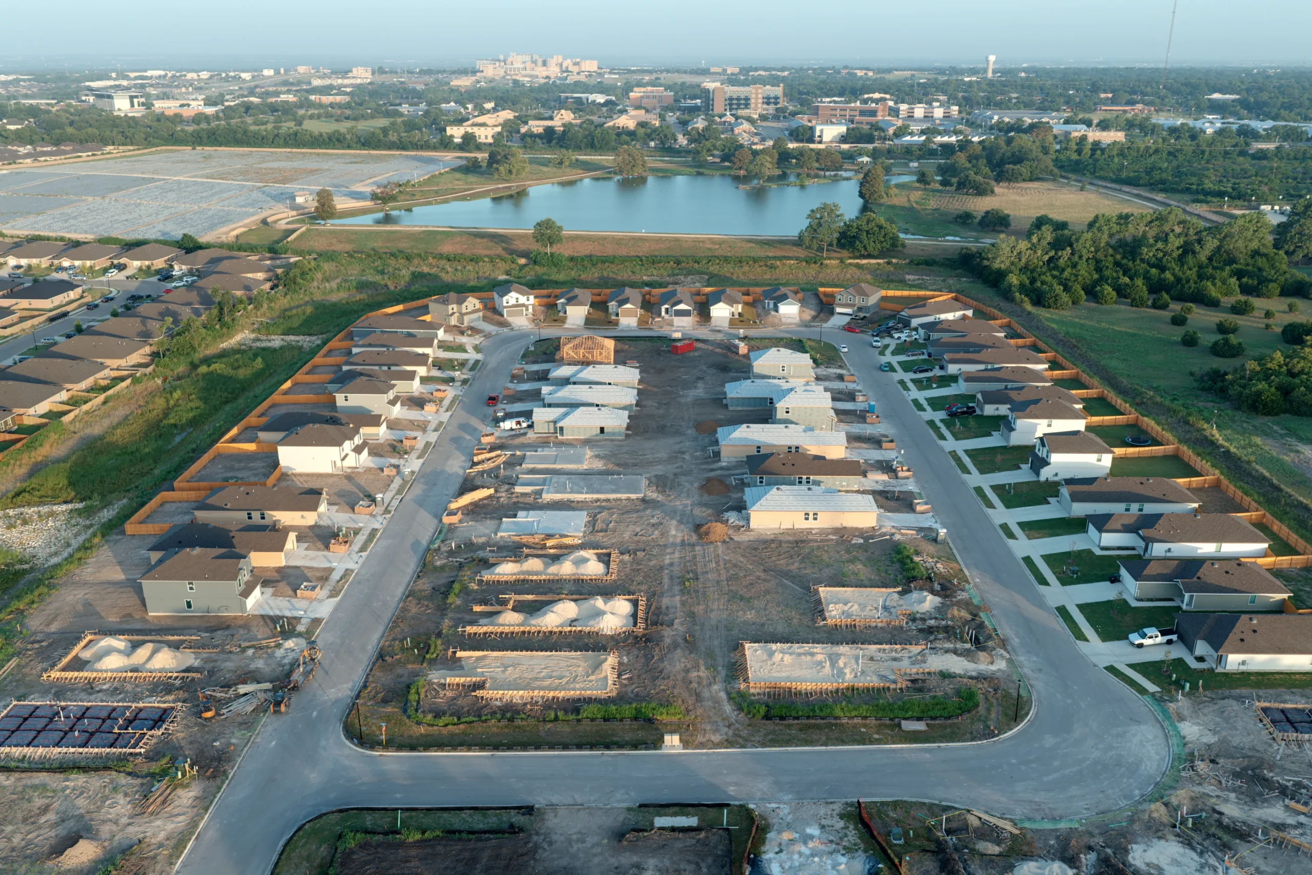 Aerial view of Pecan Creek homes and active construction in Temple TX