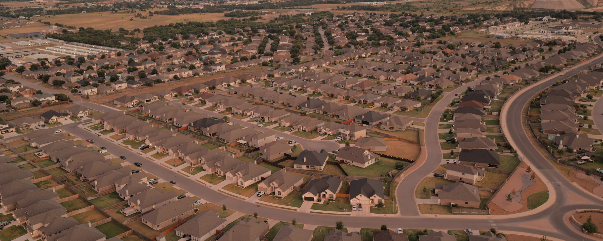 Aerial view of neighborhood streets and homes in The Groves at Lakewood Ranch, Temple TX