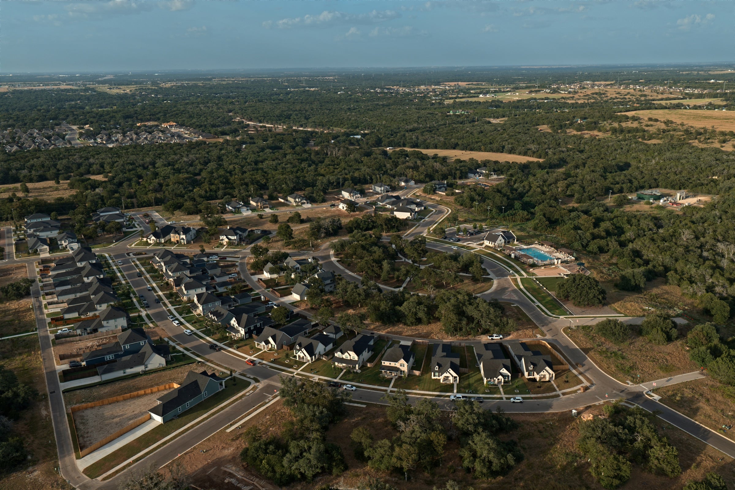 The Sanctuary community homes and amenity center at golden hour, Salado TX