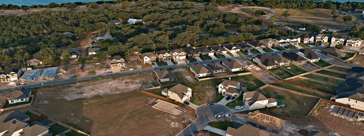 Aerial view of neighborhood streets and residential build-out in Three Creeks, Belton TX