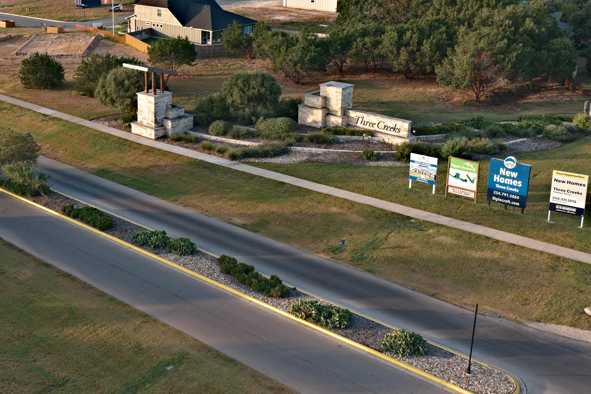 Three Creeks entrance monument and boulevard aerial, Belton TX