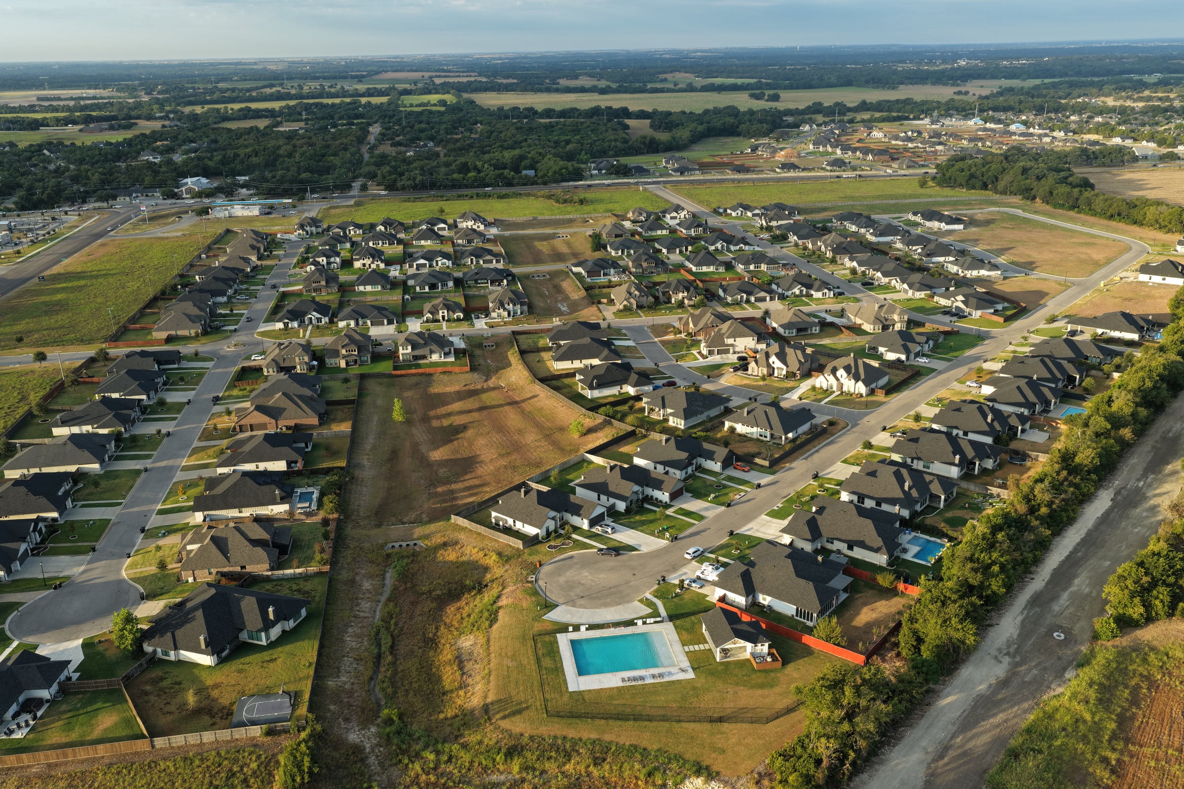 Legacy Ranch — pool and homes