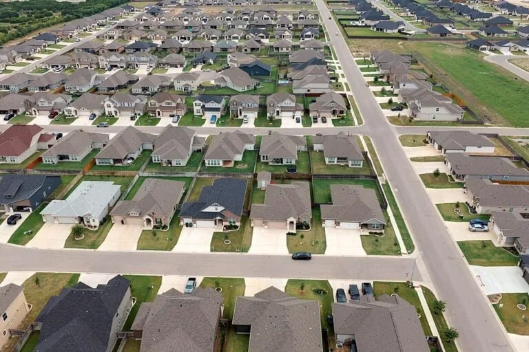 Aerial view of Mesa Ridge streets, homes and fenced back yards, Temple TX